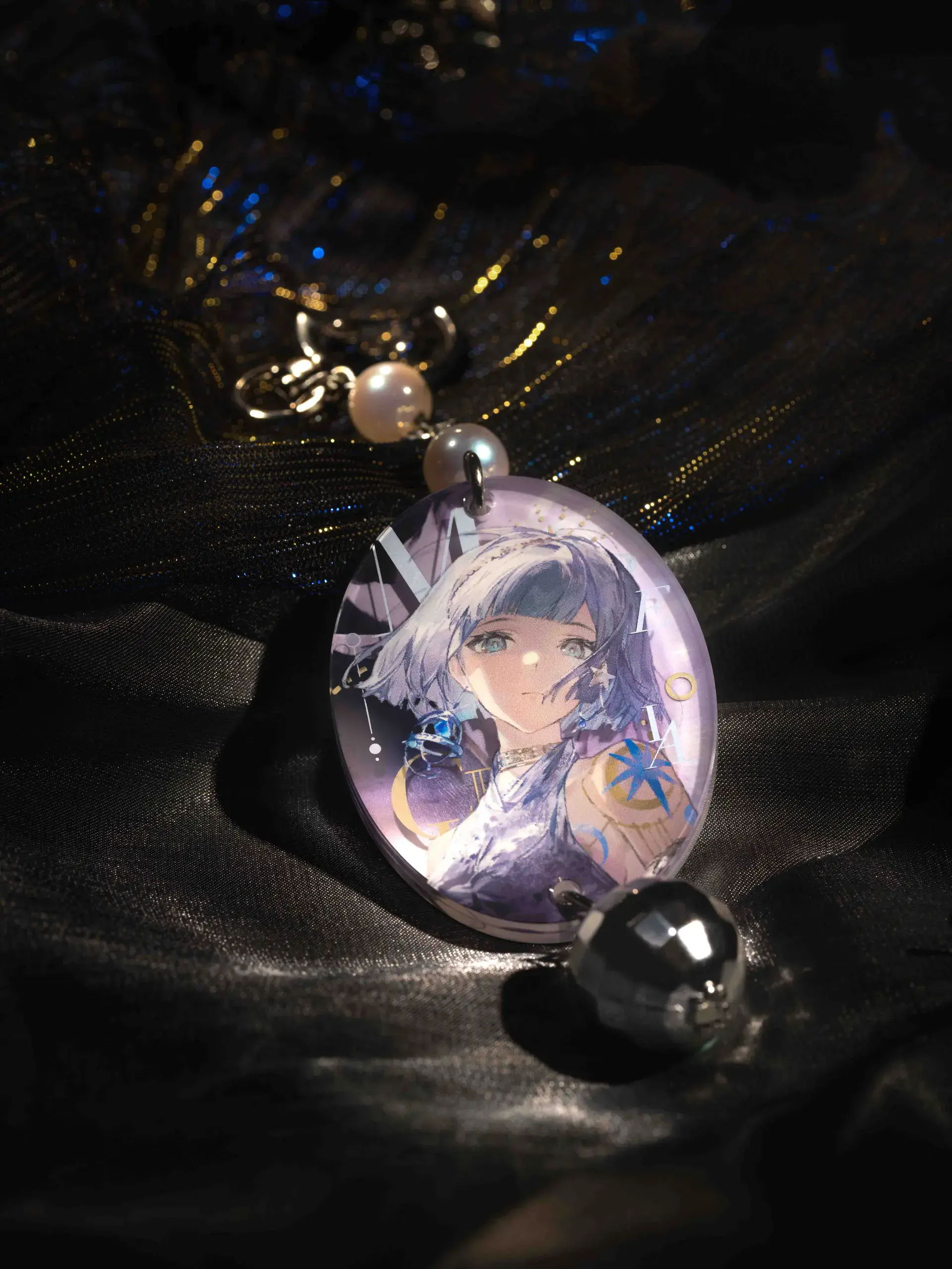 Mercuria Bag Charm - Shimmering Ball of the Night 4 Mercuria Bag Charm - Shimmering Ball of the Night shimmering ball of the night o reverse 1999 mercuria bag charm content 2