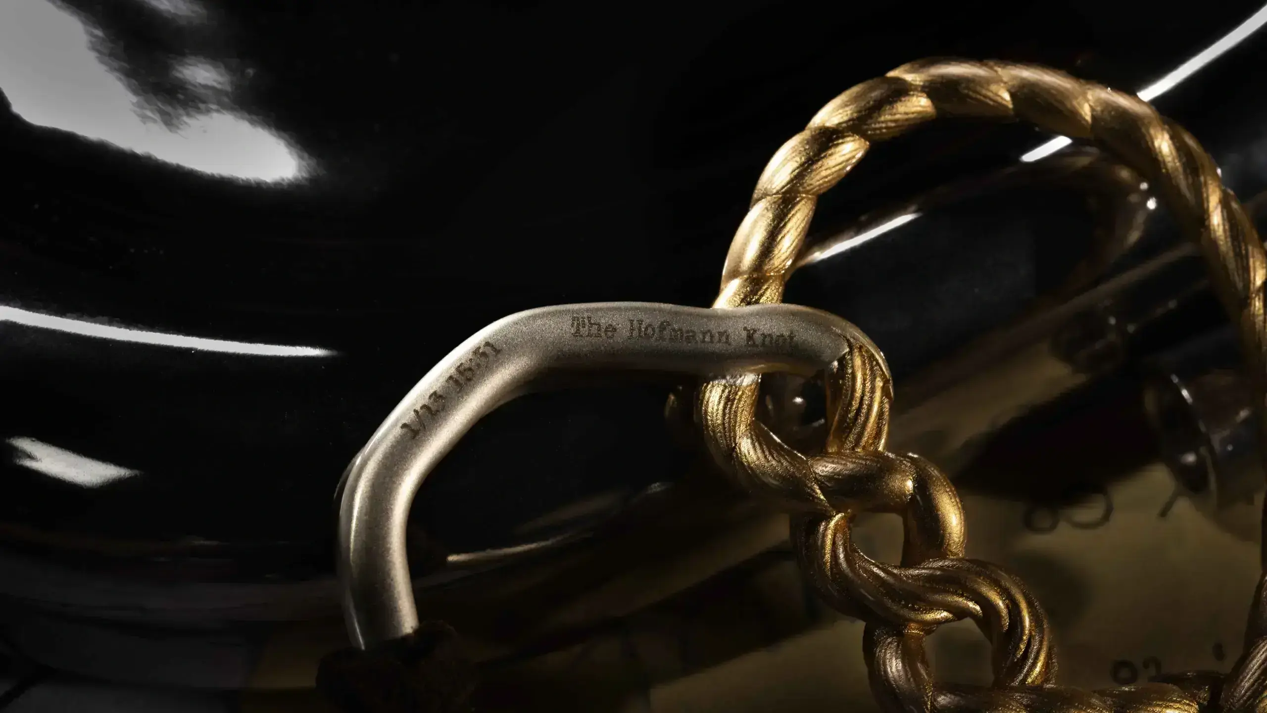 Hofmann Knot Charm - The Memorial 3 Hofmann Knot Charm - The Memorial the memorial o reverse 1999 hofmann knot charm content 1